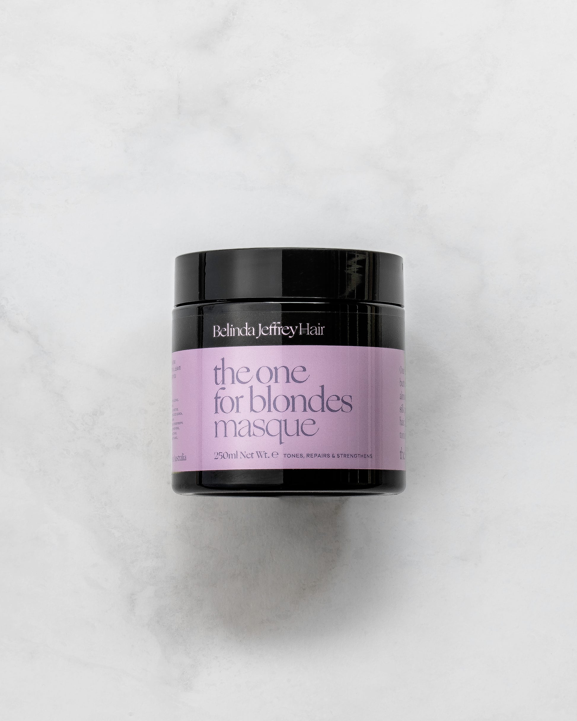The one for blondes hair masque by Belinda Jeffrey Hair. Black jar with lid and pink label.